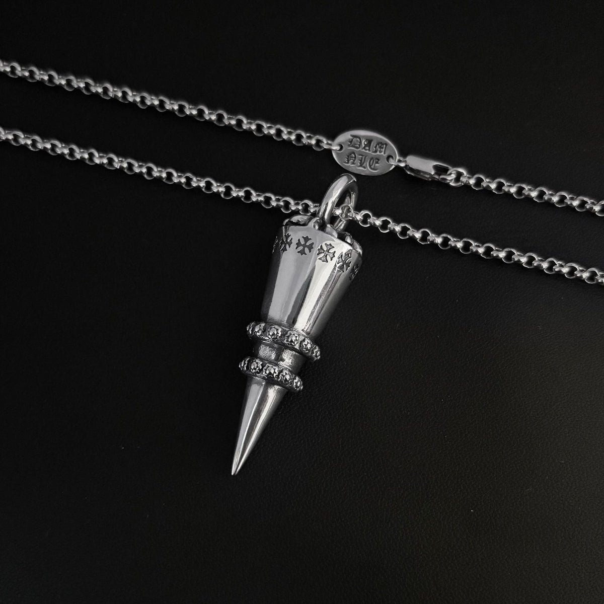 Chrome Hearts distressed cross rivet bullet pendant